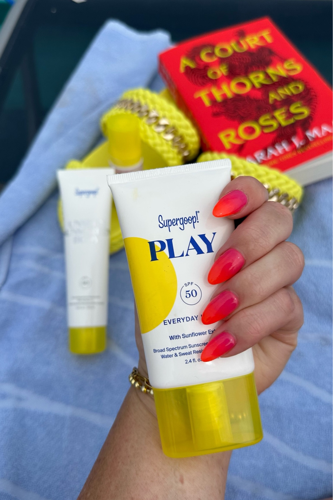 My vacation must haves! Sunscreen, books, and sandals! 