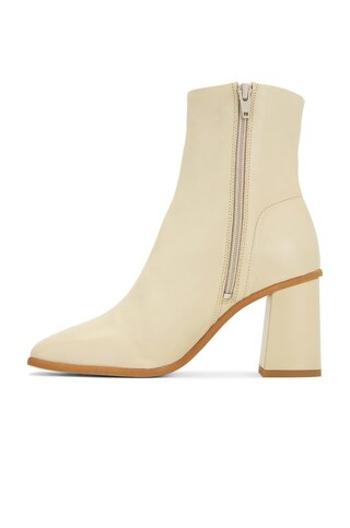 Sienna Ankle Boot in Buttercream | Revolve Clothing (Global)