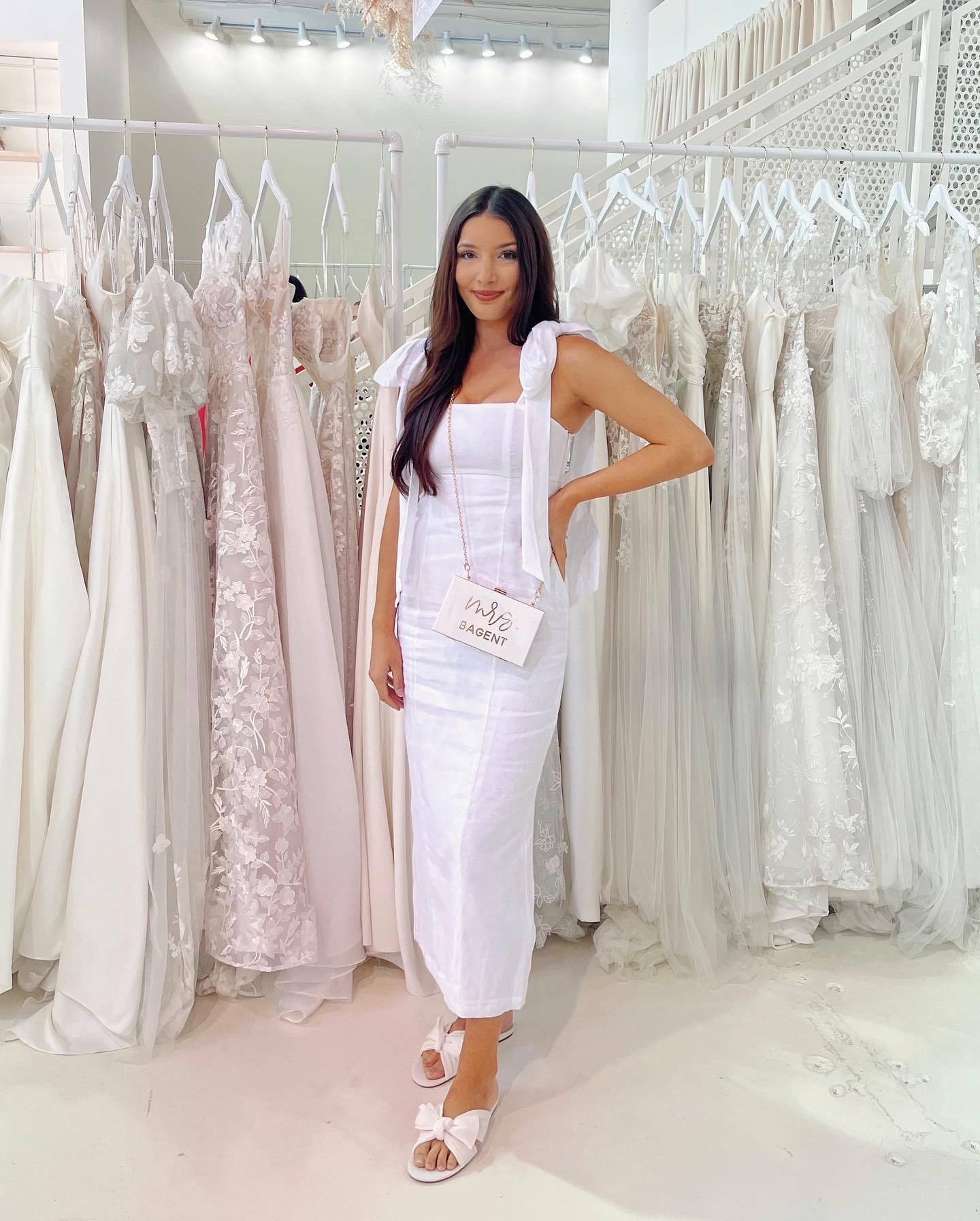 WEDDING DRESS SHOPPING! The cutest flattering linen dress with bow sleeves and bow slides (kitten heel version of the same shoe is linked!!) also got this custom clutch with gold cursive from Etsy! 🤍

#LTKfindsunder100 #LTKstyletip #LTKwedding