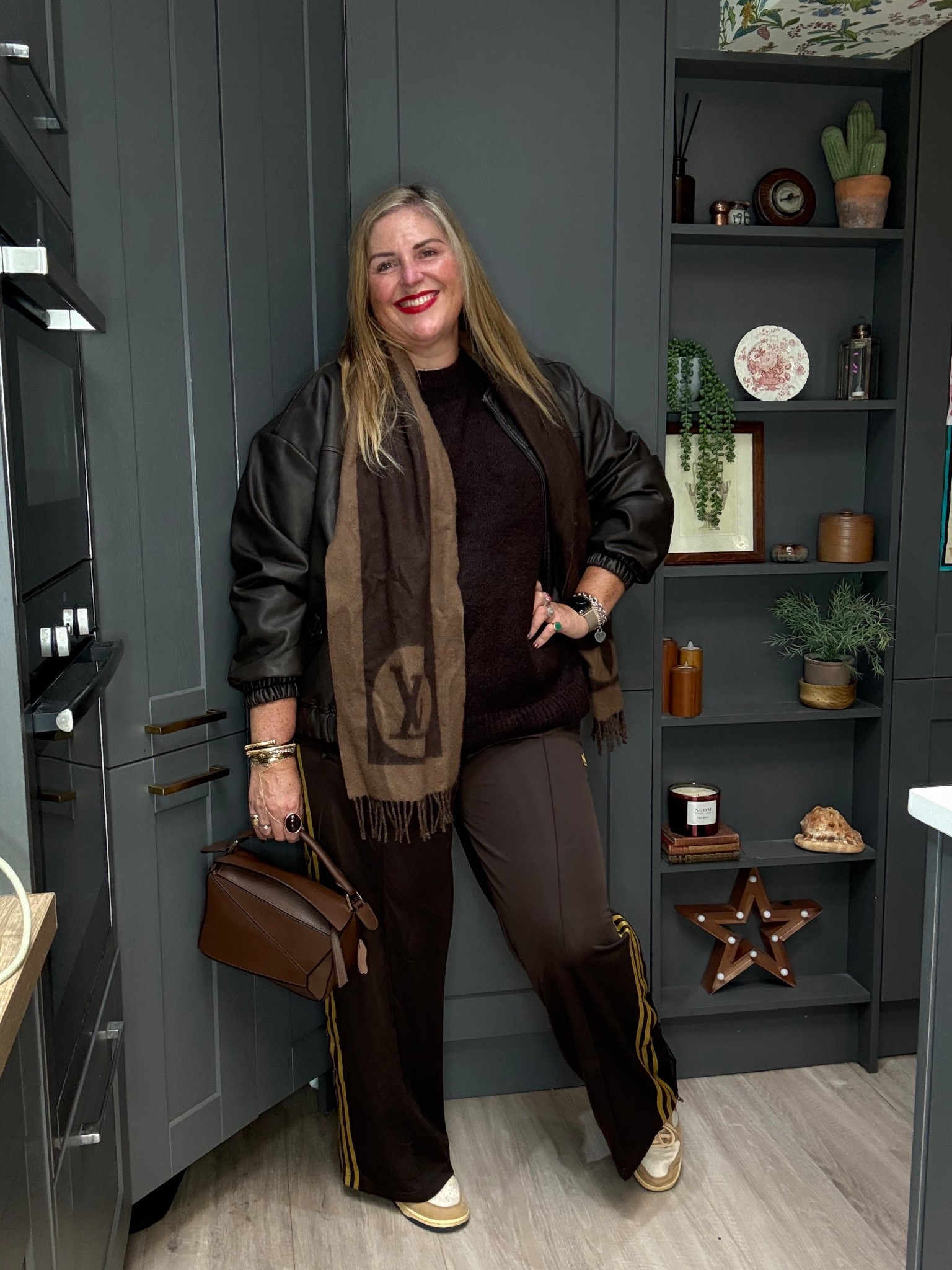 Adidas trackpants, brown jumper, faux leather bomber, bike trainers, brown bag 

#LTKcurves #LTKautumn #LTKplussize