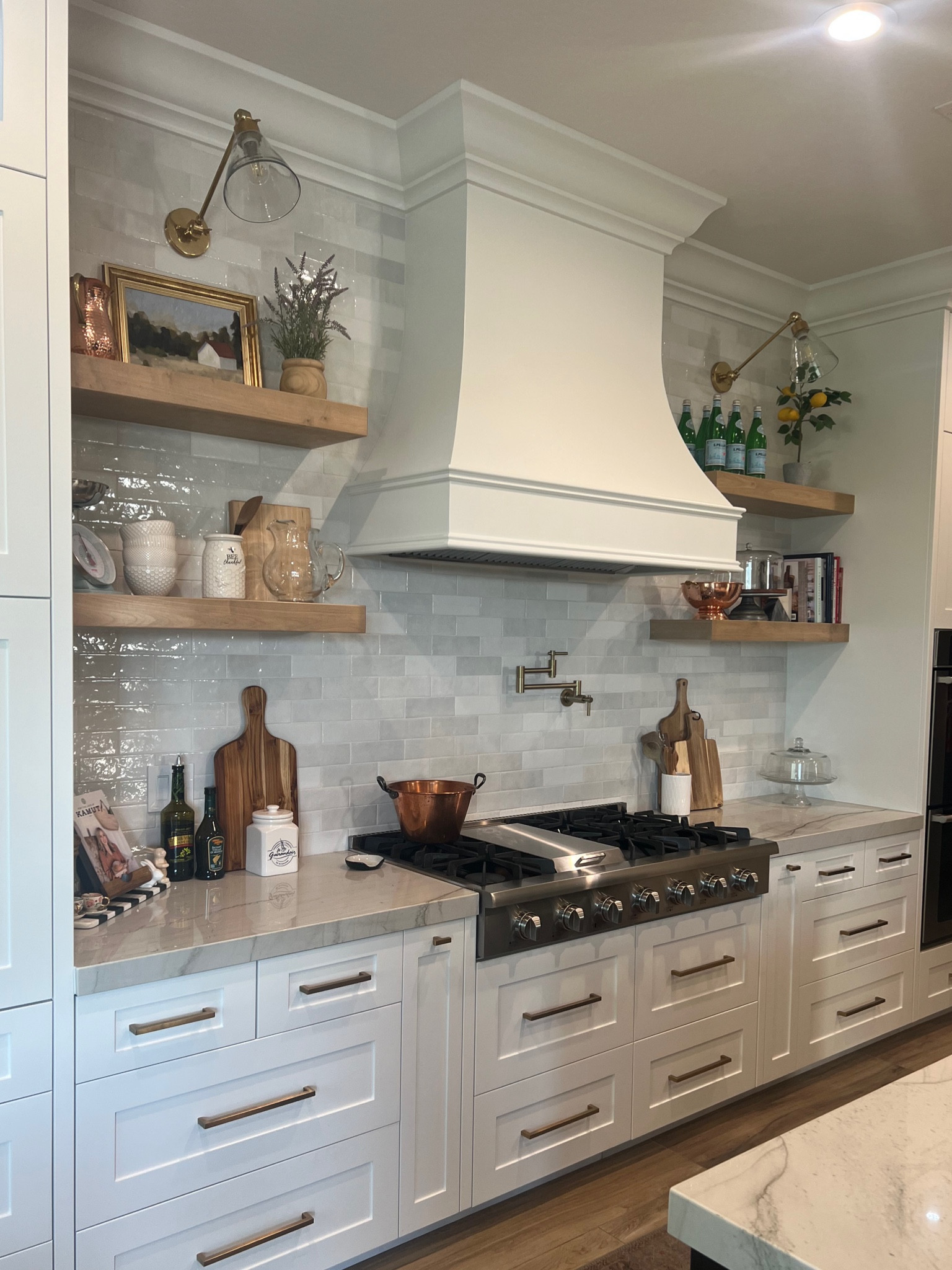 Tile and cabinetry hardware. We love this versatile time for our backsplash. Would also look great in a shower. Also comes in squares and a few other colors. The sconce lights are braised come with a glass or brass option. Loving the knobs and handles too!

#LTKhome