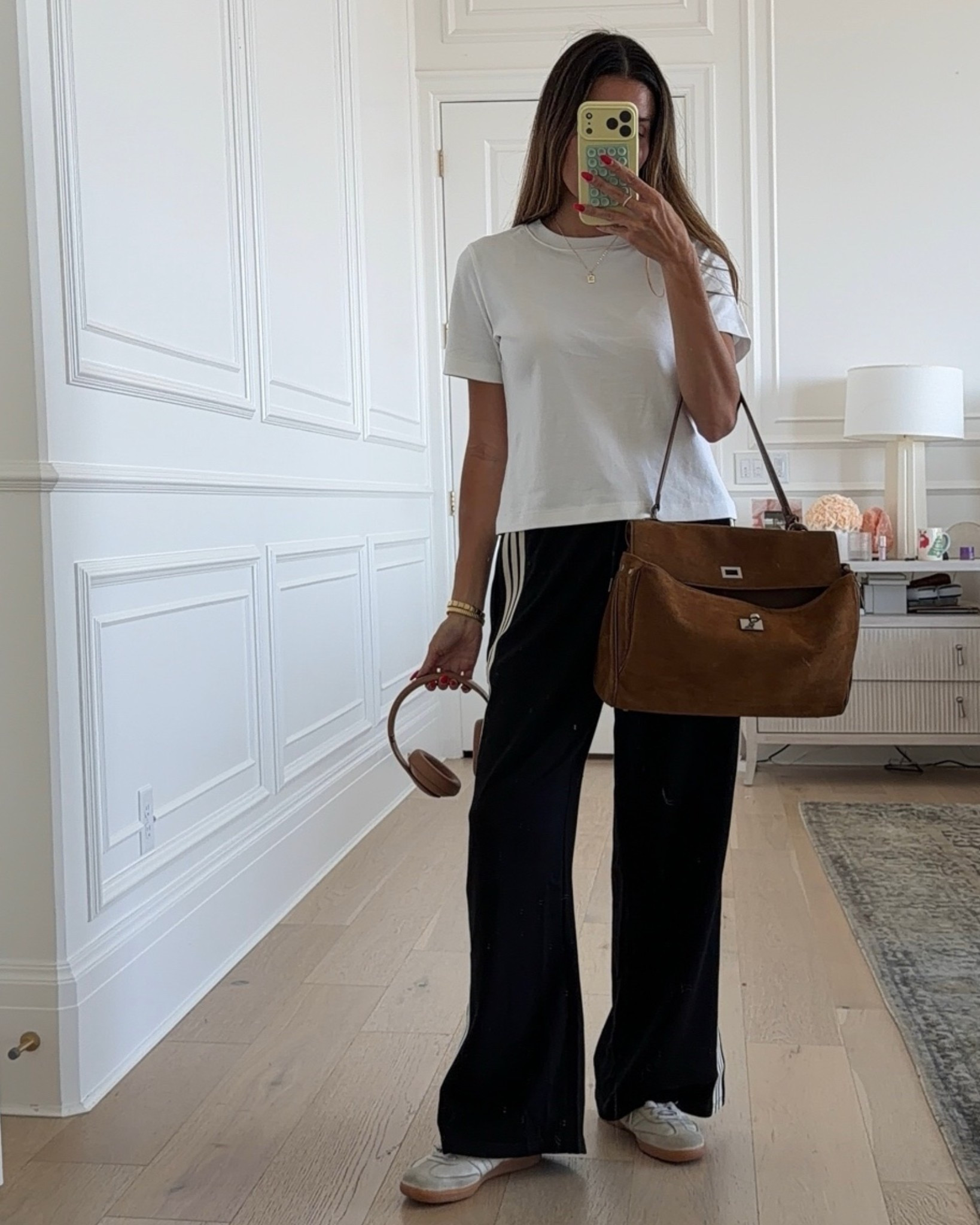 Black track pants & suede bag from Amazon - wearing size M in pants 
White tee from @Aritzia my fav!  

Amazon fashion, mom outfit, casual outfit, aritzia tee

#LTKgrwm #LTKootd #LTKOver40