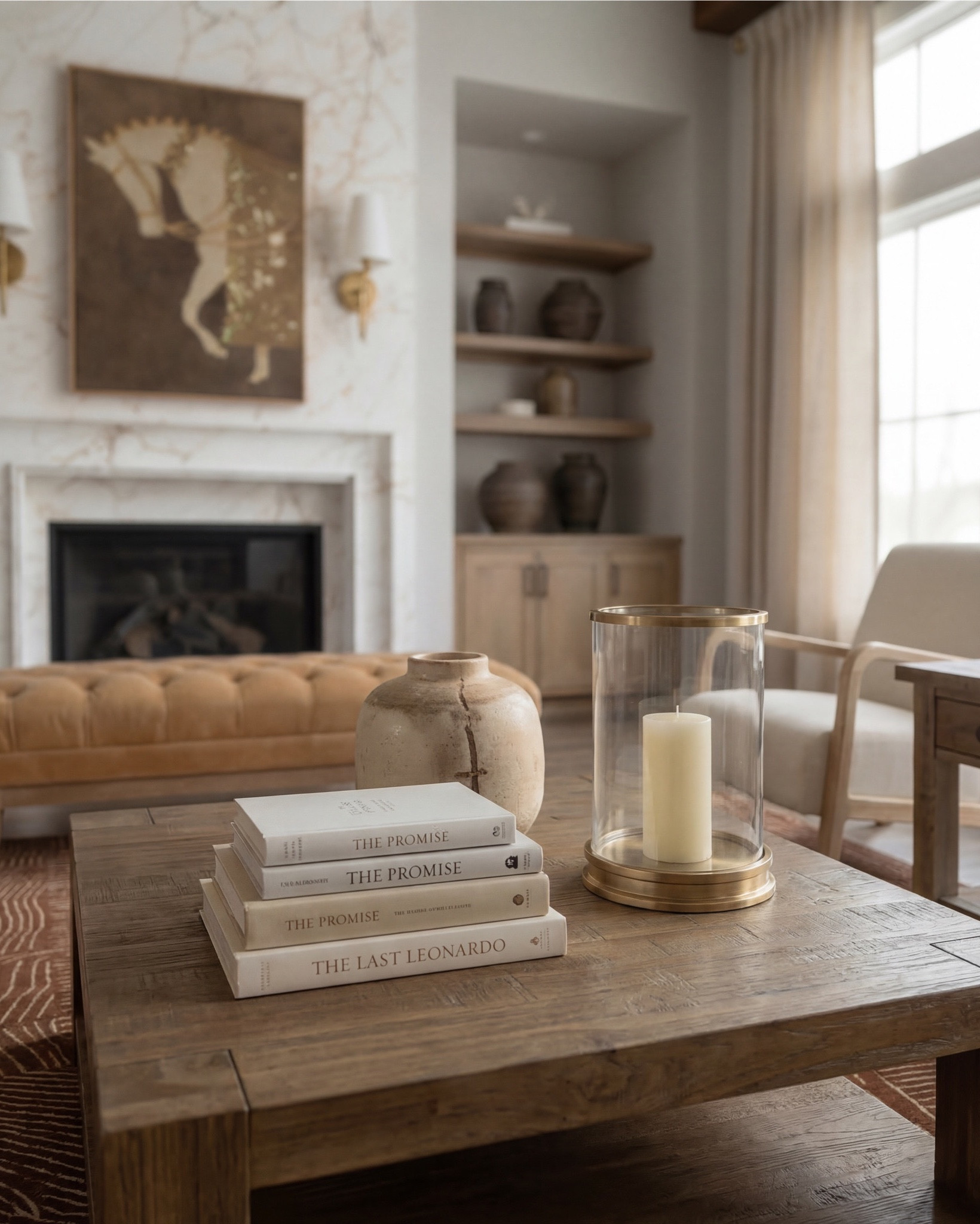 Shop the look:
* camel leather sofa
* beige upholstered accent chair 
* wood frame accent chair cream cushion
* tufted leather ottoman coffee table
* square wood coffee table
* rustic wood coffee table
* wood side table square
* round wood drink table
* brown patterned area rug
* vintage style distressed rug brown
* earthy tone geometric rug
* white globe pendant light
* brass wall sconce white globe
* modern brass sconce lighting
* neutral ceramic vase decor
* brown clay decorative vases
* glass hurricane candle holder
* pillar candle neutral
* stacked coffee table books neutral
* wood decorative bowl
* small pottery decor
* abstract neutral wall art
* modern brown beige artwork
* framed canvas neutral tones
* neutral throw pillow beige
* patterned accent pillow neutral
* textured throw blanket brown

#LTKsale #LTKhome