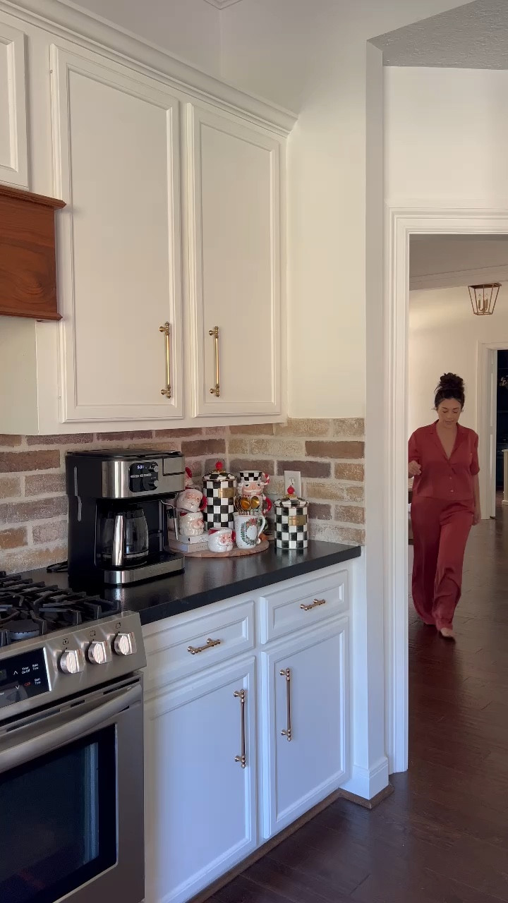 A perfect morning filled with coffee☕️, gingerbread cinnamon rolls🥐 and a kitchen filled with Christmas🎄🎅🏼 I love my @mackenziechilds classic white and black checkered print all year long but something about having it out during the holidays in our kitchen always makes it more festive 🥰🤶🏼♥️ (also makes the perfect gift 😉🎁) 

#LTKHome #LTKHoliday #LTKSeasonal