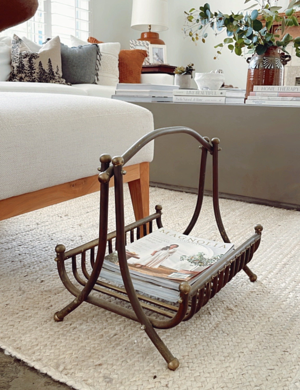 I found this vintage brass firewood holder at an estate sale a few years ago and I love to use it for my magazines! I linked some similar ones here. 

#magazineholder #homedecor #LTKhome #Decoratingideas