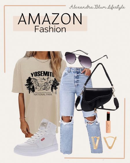 Amazon fashion finds! Casual spring outfit idea! Casual summer outfit idea! Graphic t shirt, ripped denim jeans, white high top sneakers, black crossbody purse, aviator sunglasses, gold earrings, and spring lip stick! 

#LTKfindsunder50 #LTKstyletip #LTKfindsunder100