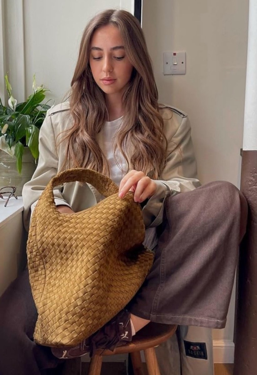 Your new favorite everyday bag. 🌿 Soft faux suede, woven texture, and the perfect easy size for daily outfits, coffee runs, casual dinners, and vacation styling. Boho but still classic enough to wear with almost everything. 

Add to cart before this one sells out. ✨

#LTKWorkwear #LTKTravel #LTKBeauty