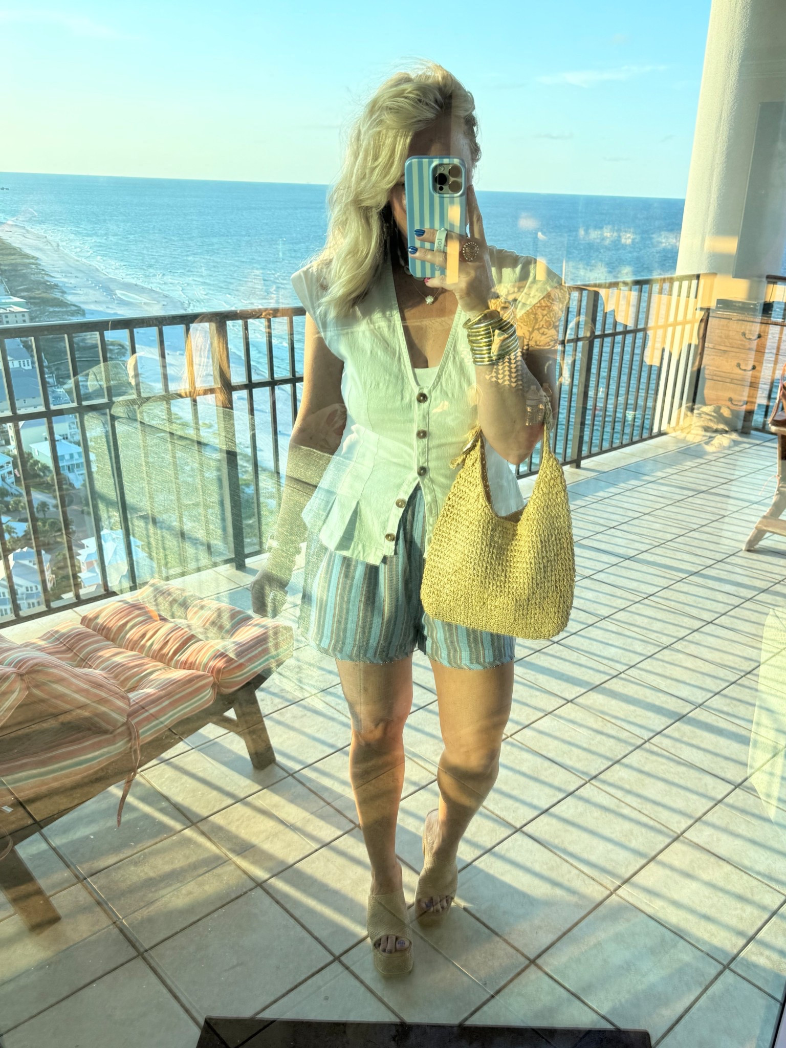 Love this top! It has mini snap buttons in between the big ones up top to keep your top closed around chest area. 
Top - M
Shorts - M
Sandals - true to size 


#LTKStyleTip #LTKFindsUnder100 #LTKOver40