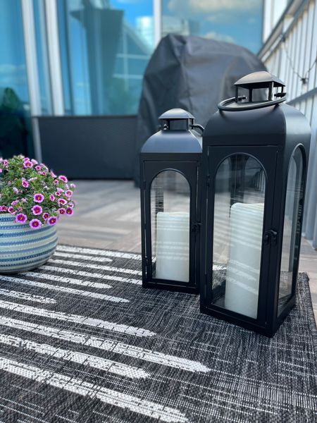 Walmart has some good outdoor patio decor for affordable prices! These Lanterns are ~$20 each. Faux candles inside the lanterns are from Amazon. Faux candles come with a remote & can be put on a timer. 

#LTKunder50 #LTKhome #LTKSeasonal
