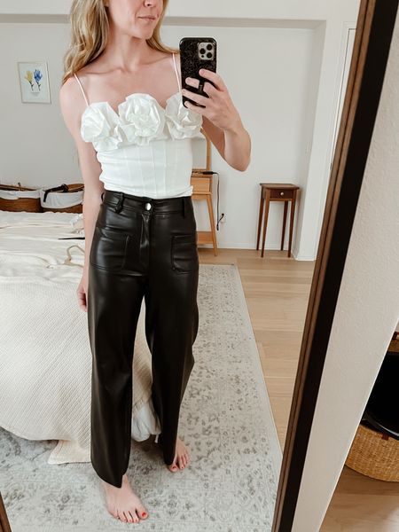 Prettiest rose corset top under $80! Runs TTS, wearing a small. Faux leather pants are Zara Marine Straight style. 

#LTKfindsunder100