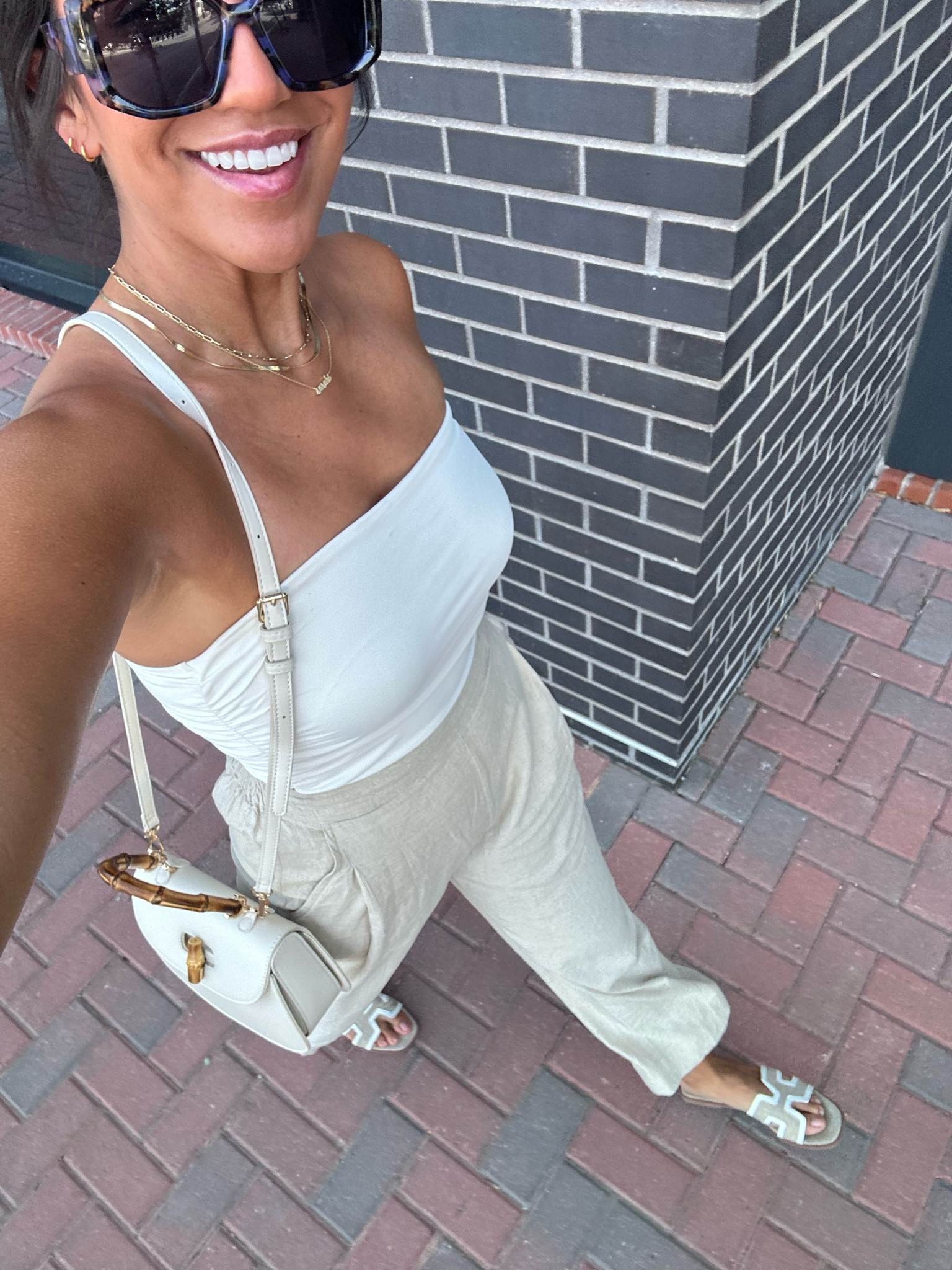 The perfect casual, breezy, neutral lewk for Friday HH 🥂

Shoes - TTS
Pants - size down 1
Top - (mine is from Marshall’s, linked similar)
Sunglasses - SO cute from Target
Bag - the cutest Gucci dupe available in Green too!
Jewelry - doesn’t tarnish! 🤩

#LTKFindsUnder100 #LTKFindsUnder50 #LTKxVICI