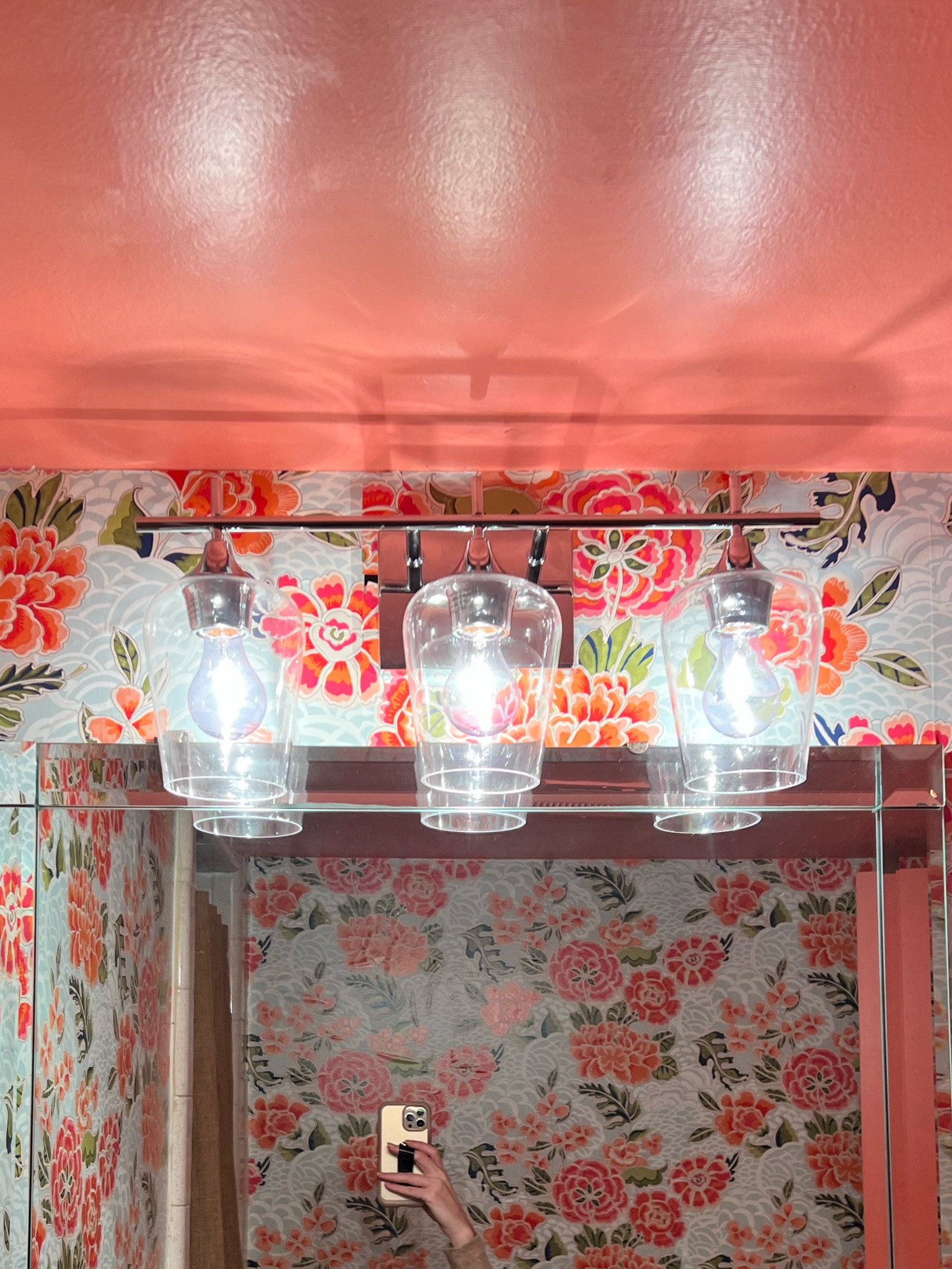 A simple, clean lined light fixture. Not too fussy, but still bright and fresh  