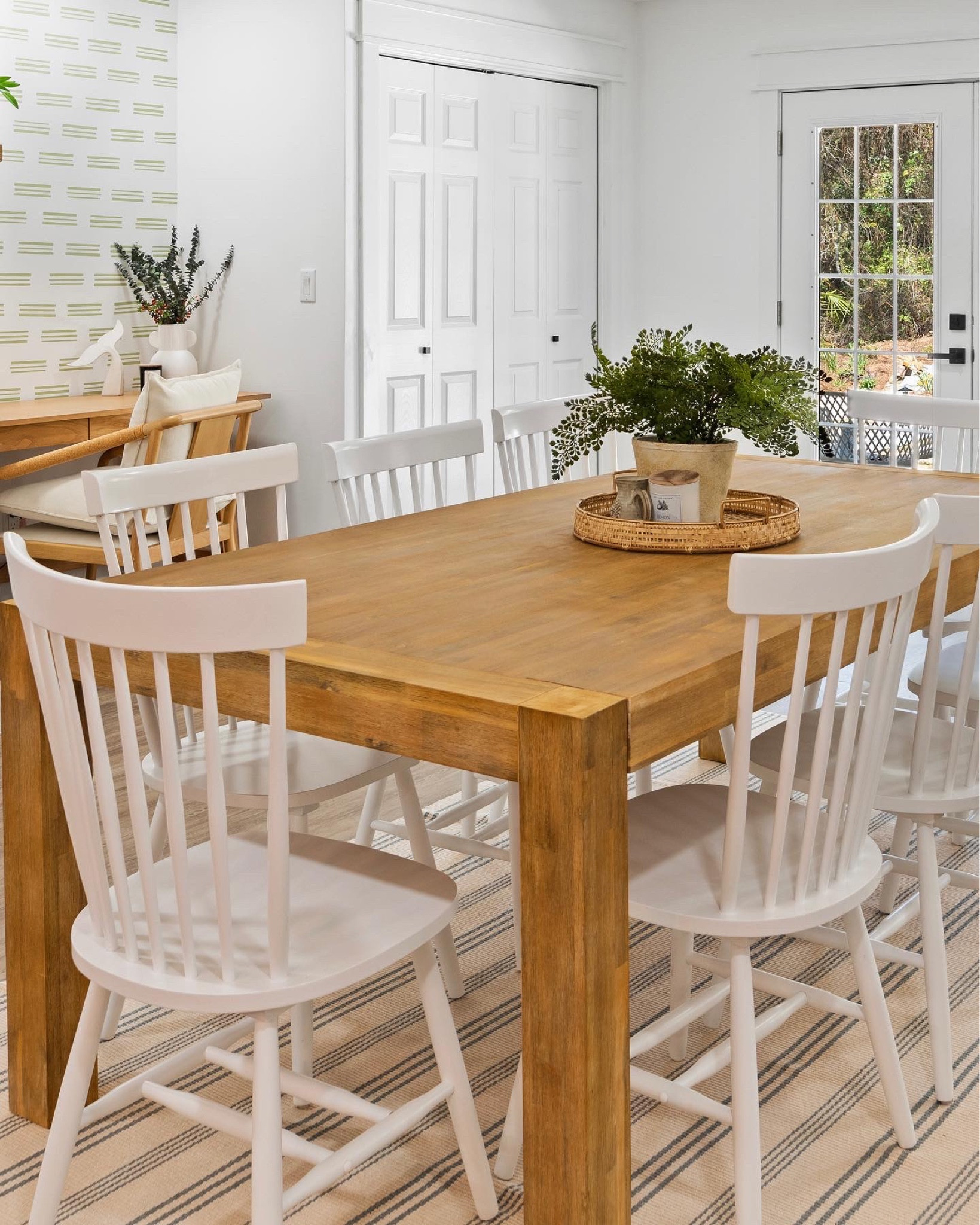 Santa Rosa Beach Project, dining area. White chairs, white vase, wall decal, artificial plant. 

#LTKhome