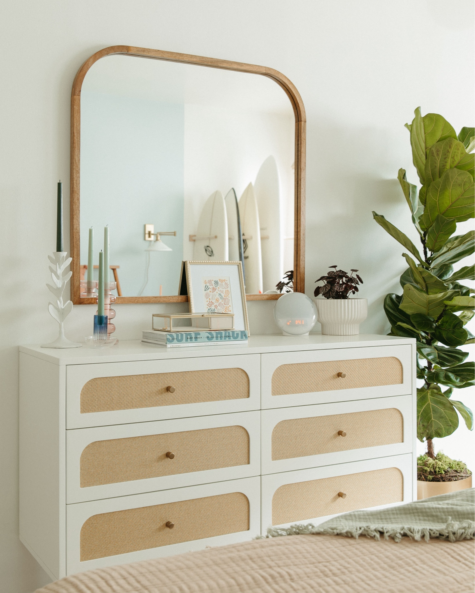 Our bedroom (and office) beachy, mid century makeover. 
Small space hack - look for kids furniture for narrower dimensions. 

Custom Framed Photography: www.wildzephyrco.com/printshop
Dresser : *kids*Crate & Barrel  
Similar option listed.
Bedding: Parachute Home & Quince. Linen sheets for a relaxed, elevated feel.
Etsy: custom light sconces 
Target: Pillows 
Rug: Chris Loves Julia * I’ve gotten so many compliments on this rug! It holds up so well with a dog and toddler 🤝🏼


#LTKHome #LTKStyleTip