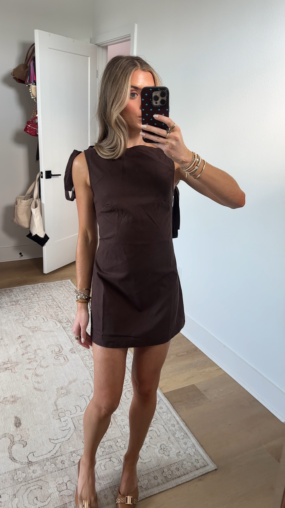 Showpo size 2. A sleek sleeveless mini with a flirty bow-back, it skims and shapes in all the right places for an easy, feel-good fit. The open-back tie detail adds just enough drama, while the clean mini length keeps it fresh for date nights, dance floors and everything in between.
Slip into Isla Mini Dress when you want instant confidence, she’s the little brown dress that works hard, from long lunches to late nights. Style with delicate earrings and strappy heels for an elevated vibe, or keep it casual with minimalist flats and a shoulder bag. Versatile, polished and party-ready, this is one of those dresses you’ll reach for on repeat.
Isla Mini Dress - Sleeveless Bow Back Mini Dress In Dark Chocolate is your new go-to for effortless dressing. Inclusive, flattering and fun, because everyone deserves to feel amazing in their Dresses.

#LTKootd #LTKgrwm #LTKSeasonal