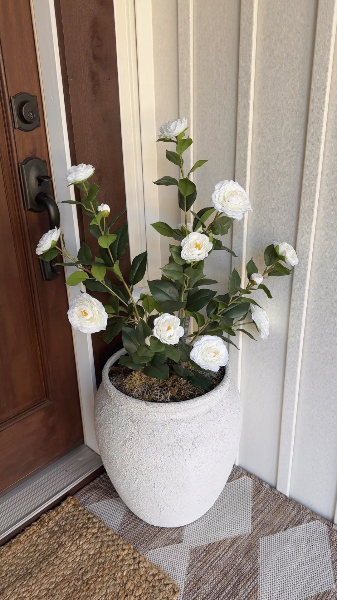 European style on a budget. ☀️  Paired with gorgeous white stone planters, these realistic faux Camellia trees instantly elevate any front porch and will look beautiful all season long - no water or potting soil required! 

#LTKSeasonal #LTKHome