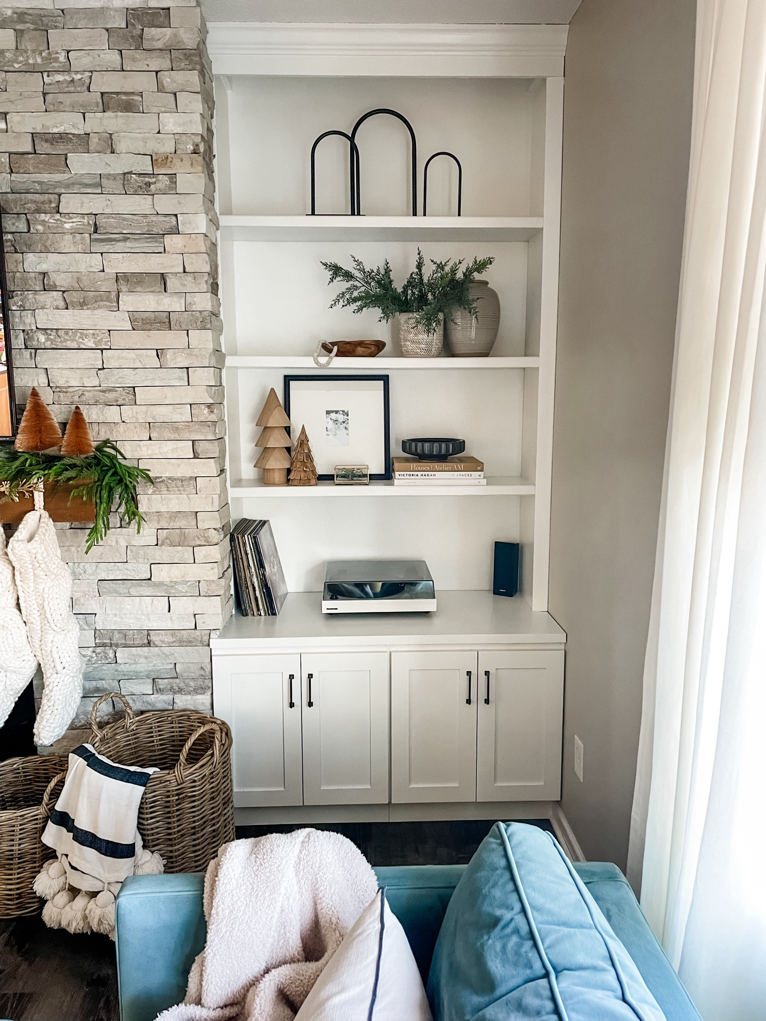 Christmas decor, neutral decor, shelf styling, shelf decor, fireplace shelves, book shelf, decorative accents, vase, coffee table book, frame, Target finds, McGee & Co, stocking, basket, record player, records, decorative objects, amazing finds.

#LTKSeasonal #LTKHoliday #LTKhome