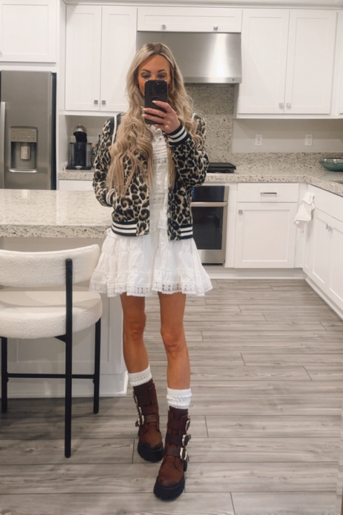 White mini dress, leopard jacket, and brown Moto boots

#LTKStyleTip