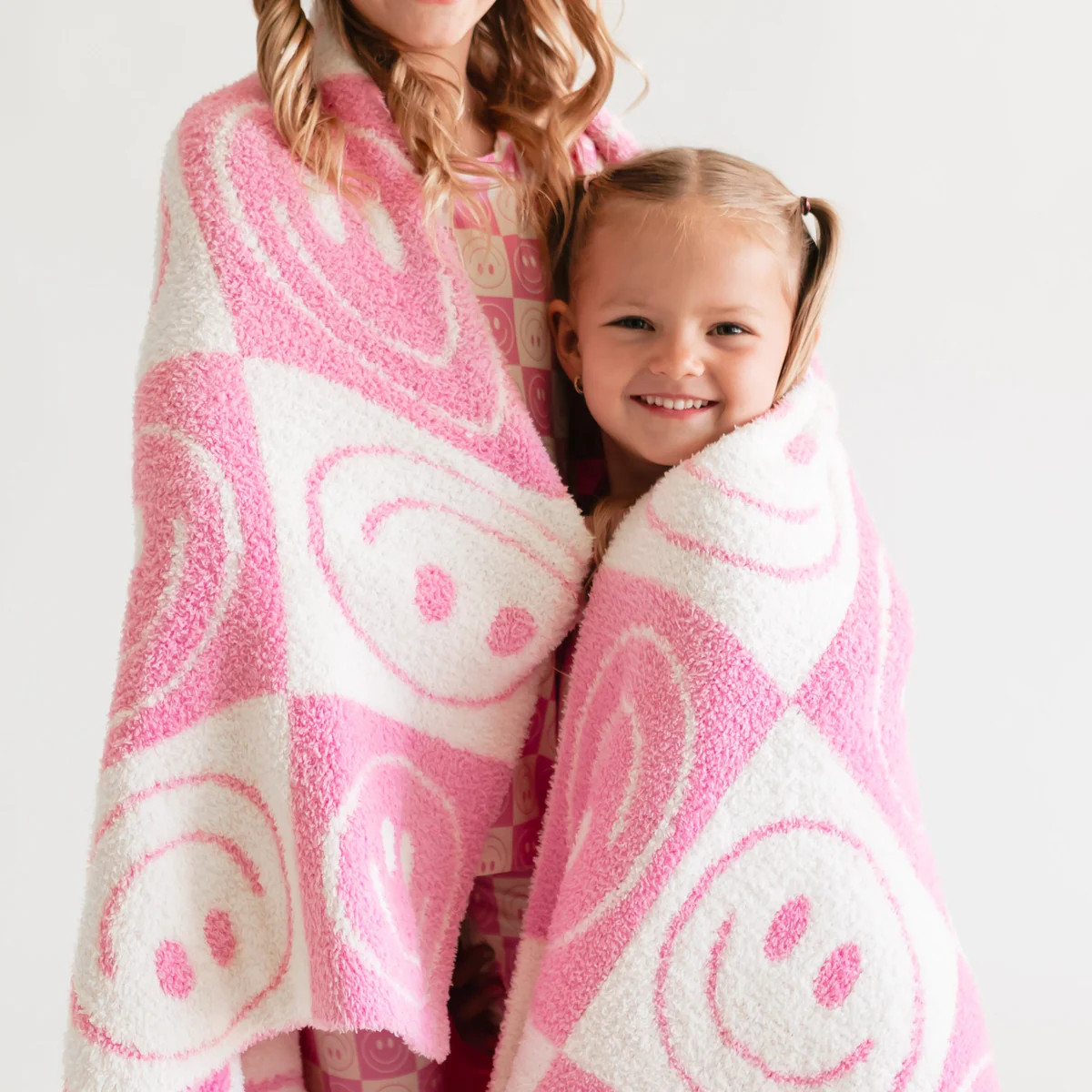 Youth Plush Throw Blanket in Pink Checkered Smiley | Silks Design