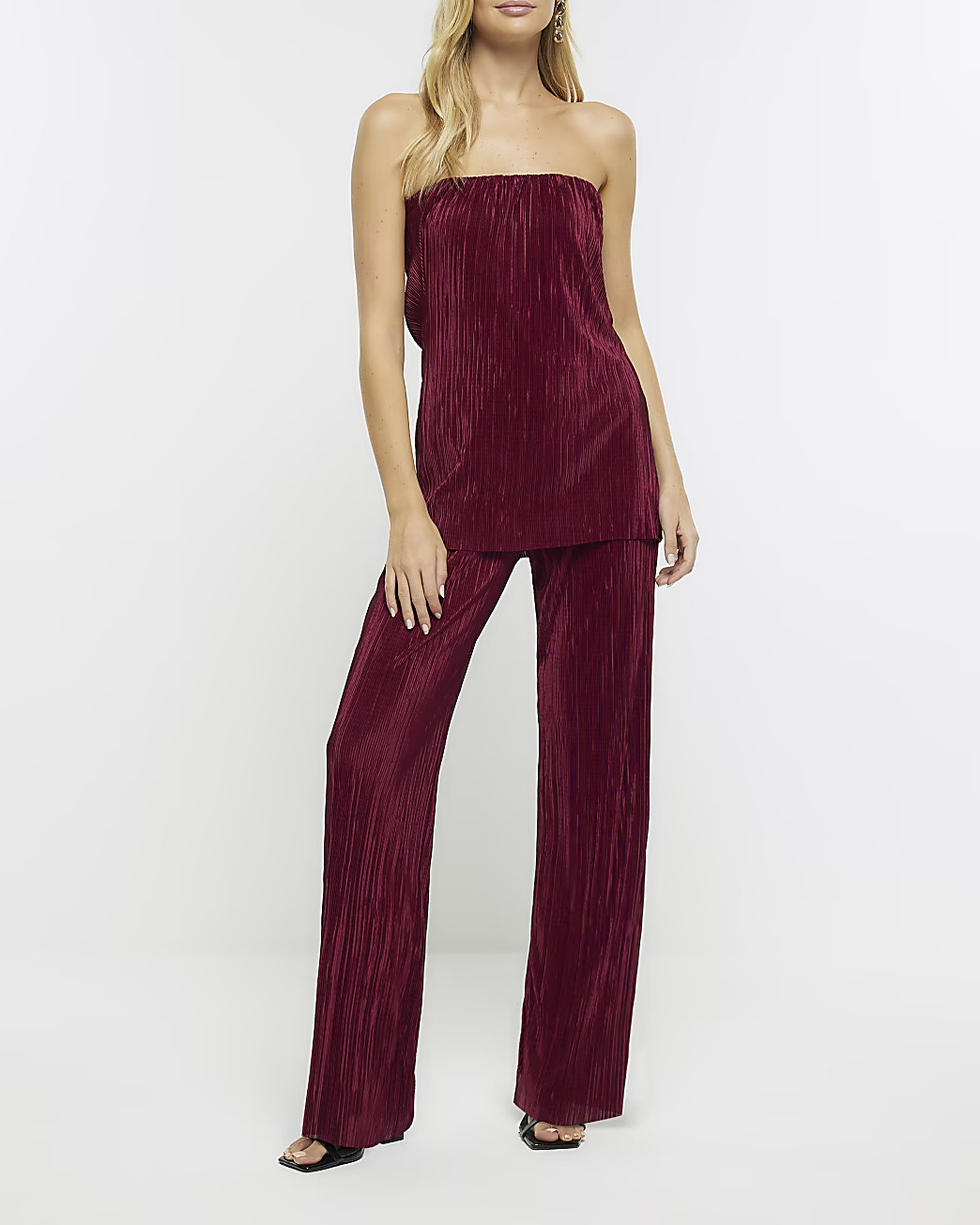 Red plisse flared trousers | River Island (UK & IE)