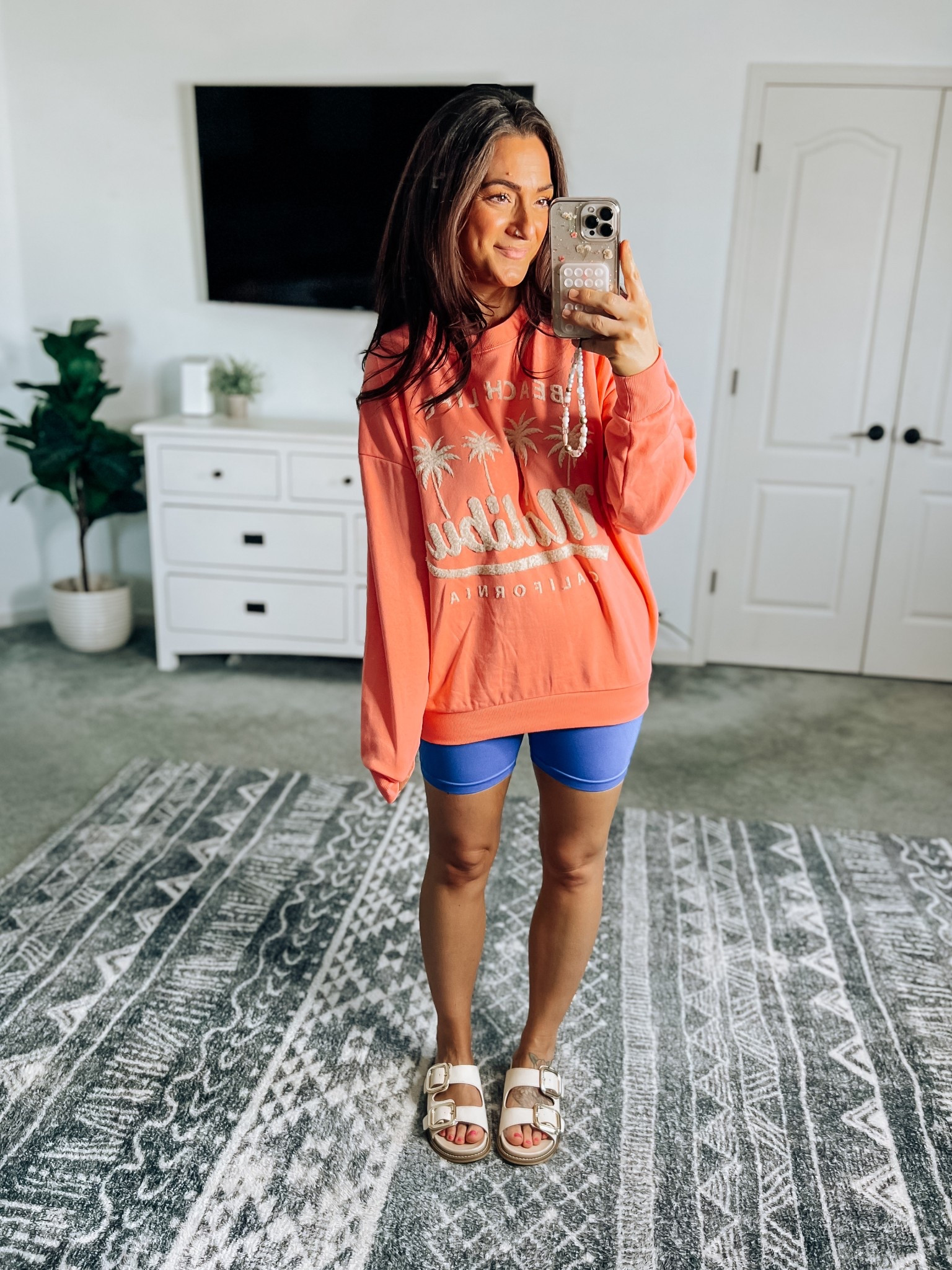 Who doesn’t love sweatshirt and shorts weather?! 🙌 love this cute Walmart sweatshirt! Soft and cozy, size up for an oversized fit. Bike shorts have no front seam and are perfectly compressing 👌 Target sandals 40% off today!! TTS

#LTKSaleAlert #LTKSeasonal #LTKShoeCrush