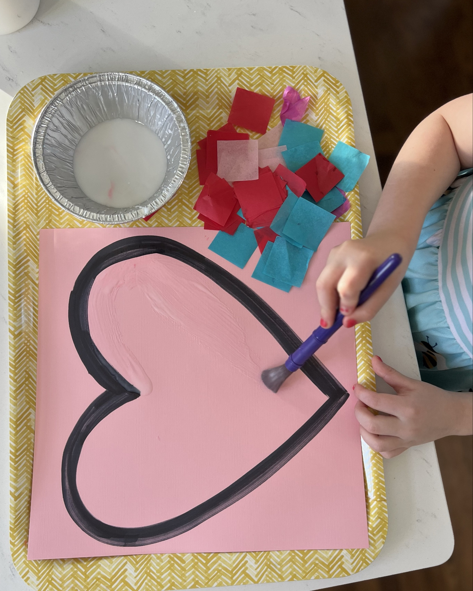 Easy Valentine’s Day craft for kids! Cardstock, tissue paper, and a glue/water mix (pour glue in a small dish and then slightly thin it with water). Paint on the glue mix, lay tissue paper, and paint over with another layer of your glue mix!

#LTKKids #LTKFamily #LTKSaleAlert