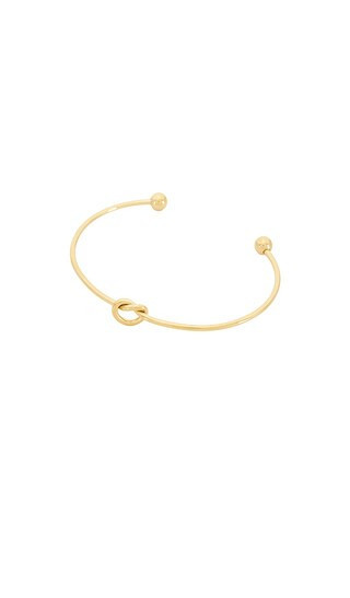petit moments Knot Bracelet in Metallic Gold. | Revolve Clothing (Global)
