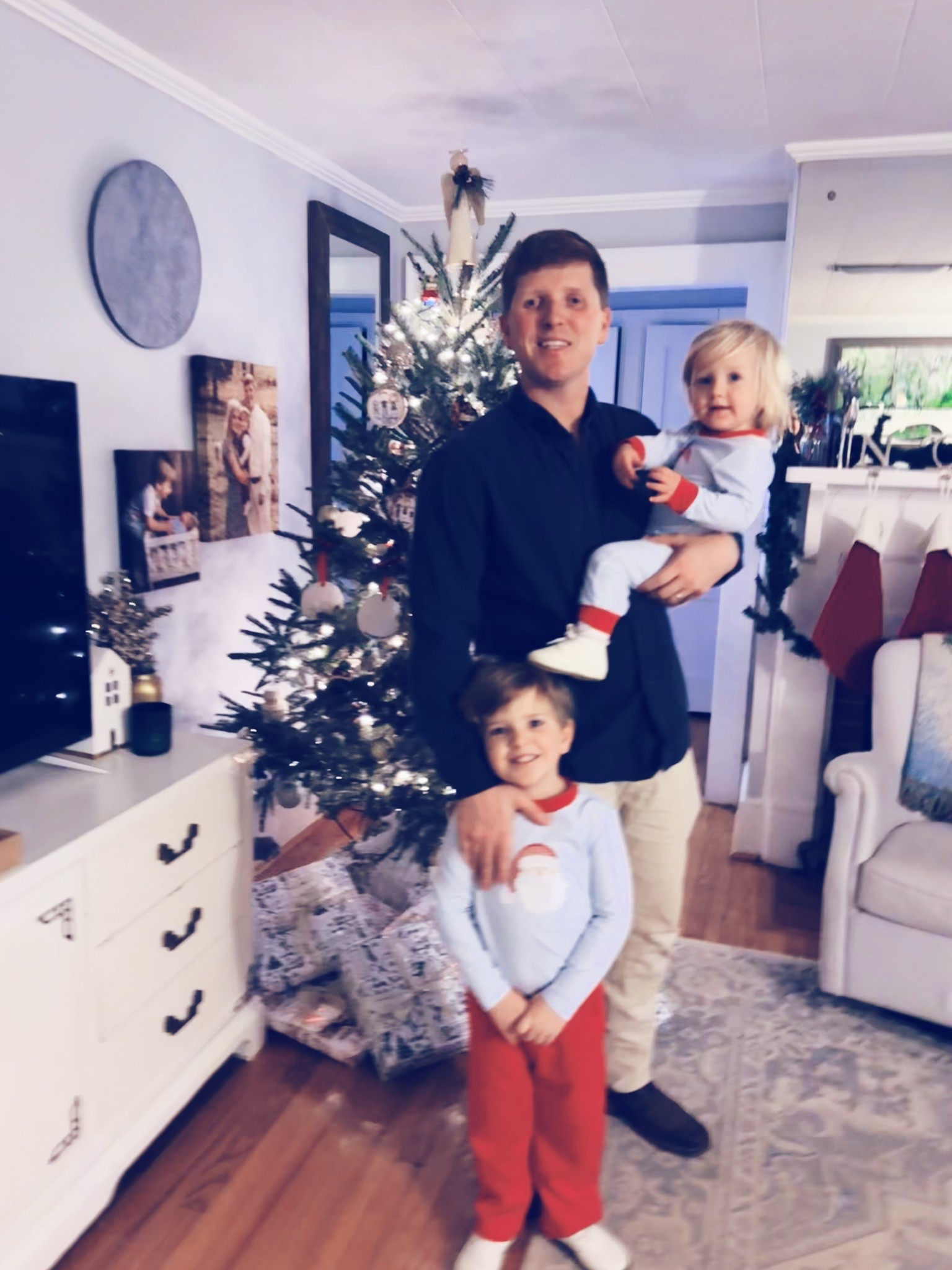 Church with these handsome boys this morning 💒❤️ - and gosh how I love all the twinkling trees 🎄 up on stage during service!! ✝️