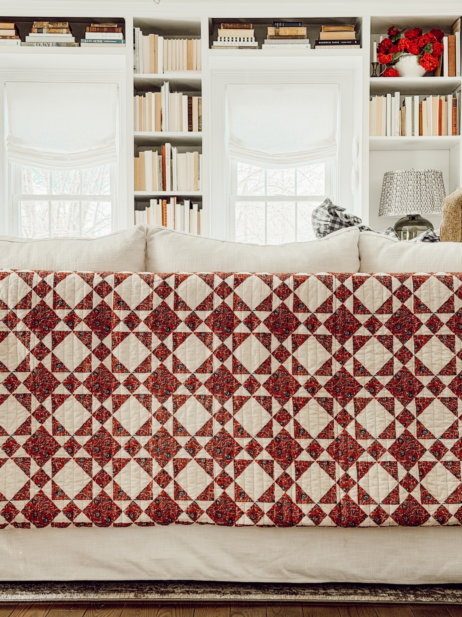 Draped this red patchwork over the back of our couch for summer.

#LTKHome