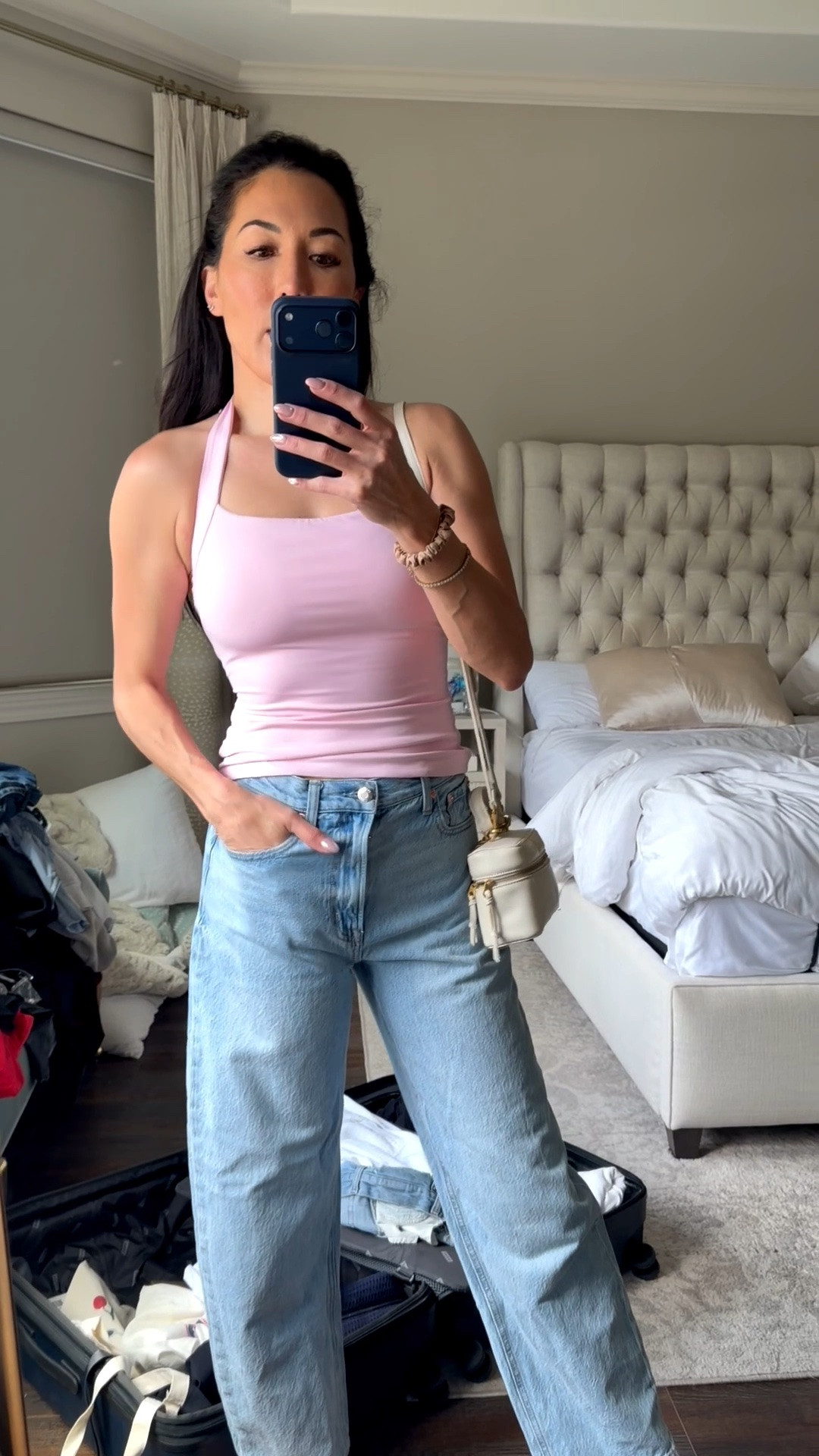 This halter tank top is summer perfection! I have it in pink, white and black. Wearing a size small.

#LTKootd #LTKOver40