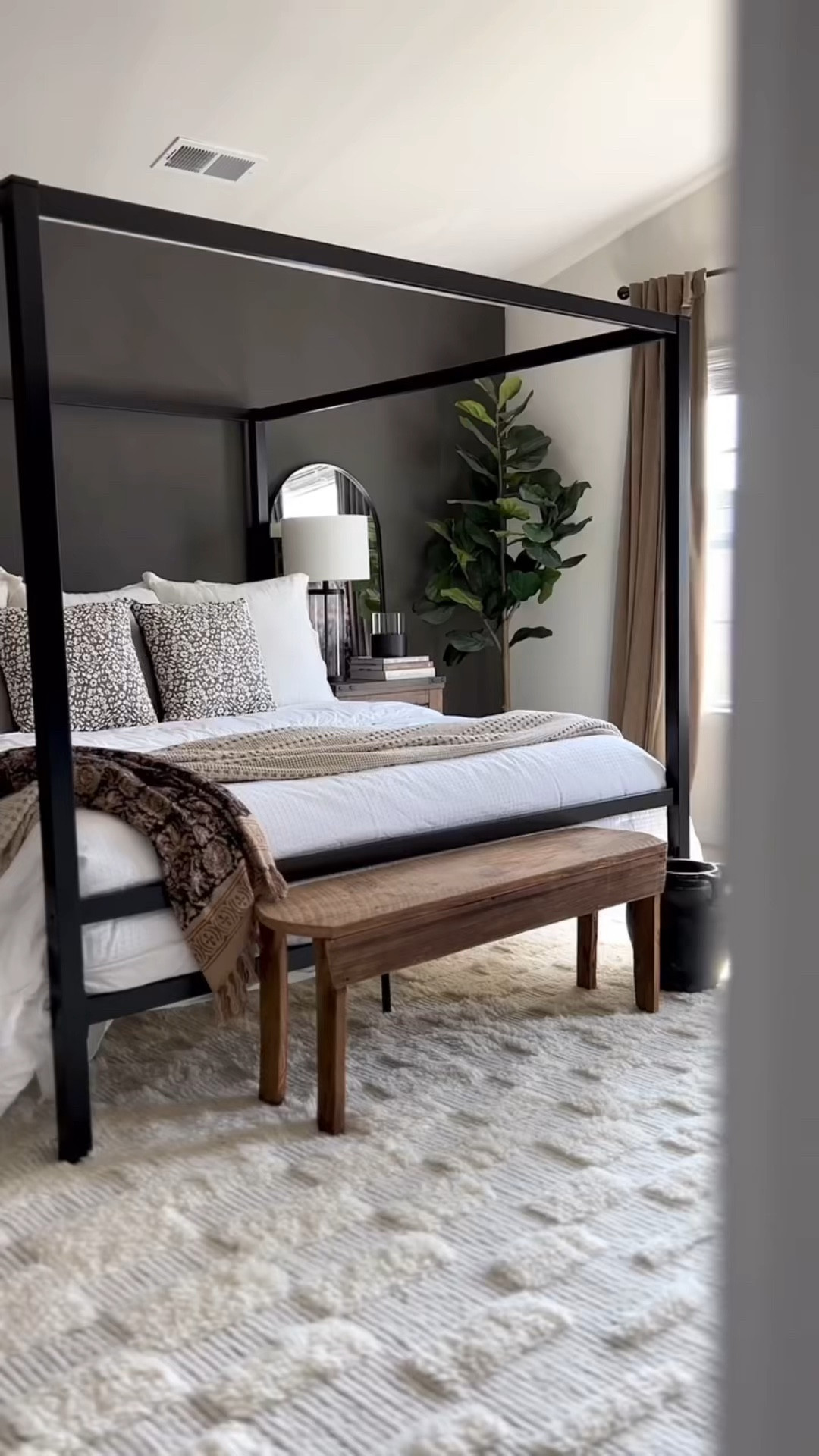 Moody modern bedroom decor on a budget!
Canopy bed, velvet curtains, rustic modern decor, rustic nightstands, waffle weave bedding, fiddle leaf tree, bedroom area rug, glass table lamp, organic modern bedroom, Amazon home decor favorites 

#LTKWatchNow 

#LTKSaleAlert #LTKHome