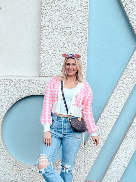 Distressed denim jeans and a vibrant pink cardigan for Disney! 

#LTKxTarget #LTKtravel #LTKmidsize