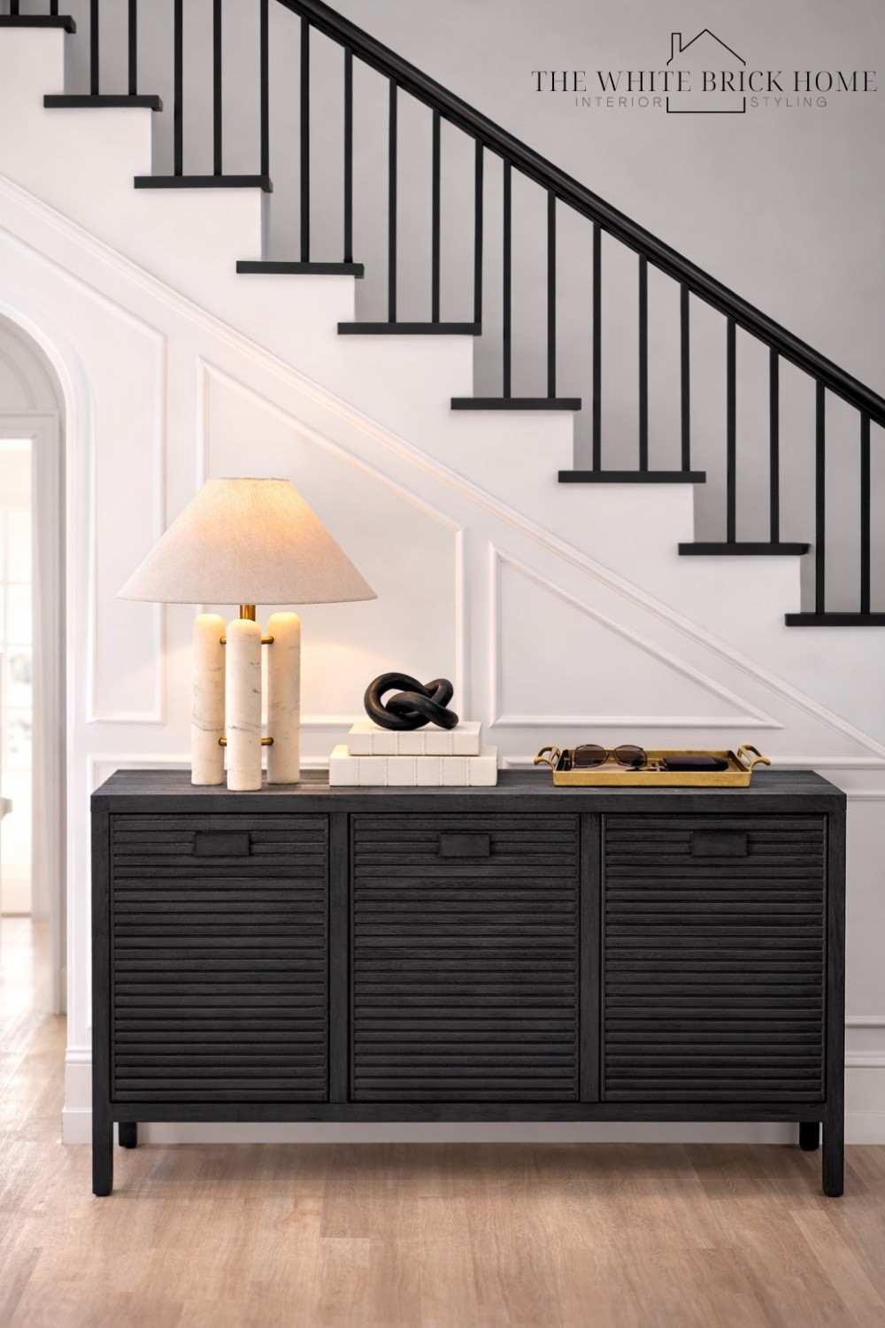 Beautiful entryway styling that looks designer - a black storage table, sculptural decor, and a chic catch all try for everyday essentials! 

Entryway, cabinet, table lamp, home decor, home accessories, foyer table, home decor ideas, home accents. 

#LTKSaleAlert #LTKSeasonal #LTKHome