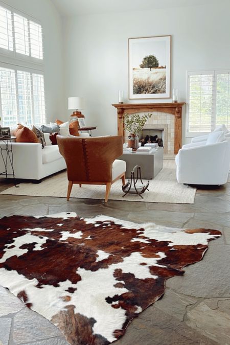 This cow hide rug has seen just about every room. 😂 Now trying it in the entryway. 

#cowhide #arearug

#LTKhome