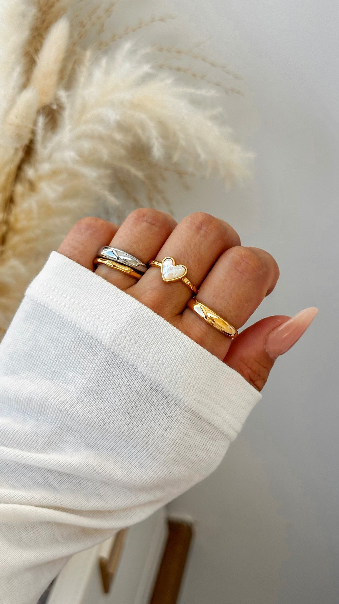 Mixed metal ring stack 

#LTKuk #LTKspring #LTKAprilSpotlight