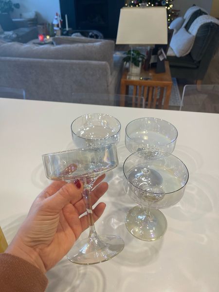 Coupe glass. 
Iridescent. 
Anthropologie. 
Cocktail glasses. 
Pretty things  

#LTKfamily #LTKparties #LTKHoliday