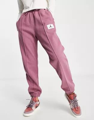 Nike Jordan Essentials cuffed fleece sweatpants in berry red heather | ASOS (Global)