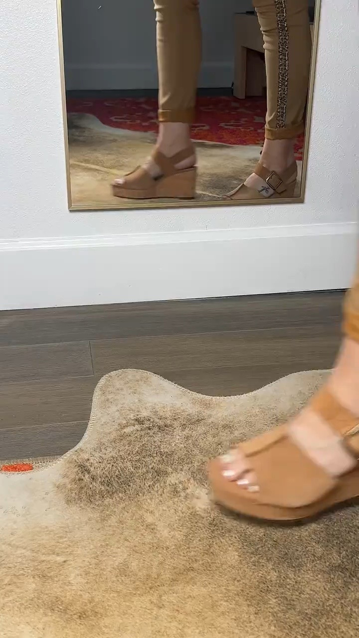 these clarks wedges are one of those pairs you can actually wear all day without thinking about your feet — the cushioned footbed makes a huge difference, and the adjustable strap gives you that secure fit that doesn’t slide around. i love the cork wedge because it gives you height but still feels stable and easy to walk in, and the black leather goes with literally everything from jeans to dresses

#ltkshoes #everydaystyle #comfortwear #springoutfits #momstyle