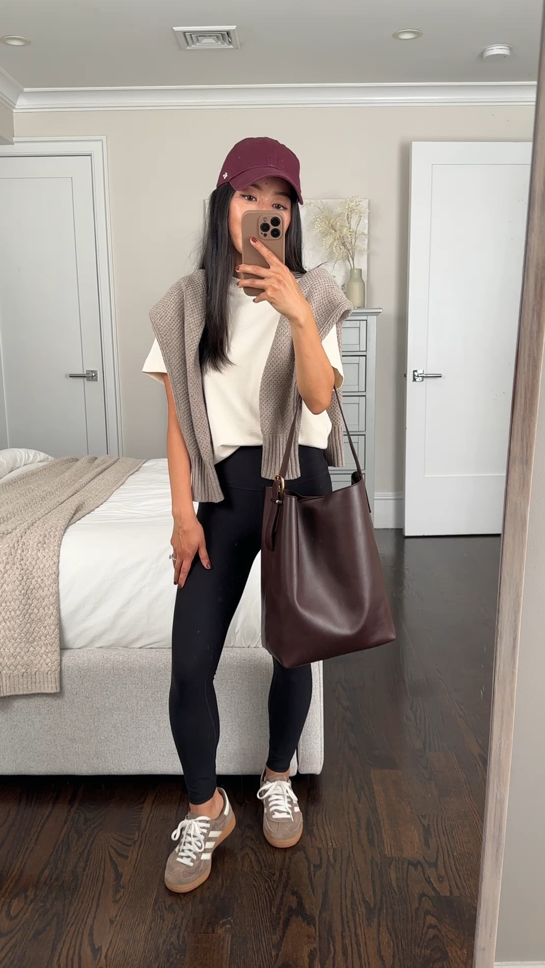 Super Casual / travel fall capsule wardrobe outfit.

• COS tee Xs - off white. thicker and not sheer. one of my go to higher quality t shirts 

• Over the shoulders: Old Everlane honeycomb sweater, linked current version  and a very similar color one

• Zella 7/8 leggings , also love AF short in XS (i size up)

• Adidas Spezial sneakers 5. Runs half size big , so size down if you’re between sizes 

• 47 brand baseball cap 

• Madewell bucket tote 

#LTKItBag #LTKTravel #LTKFamily