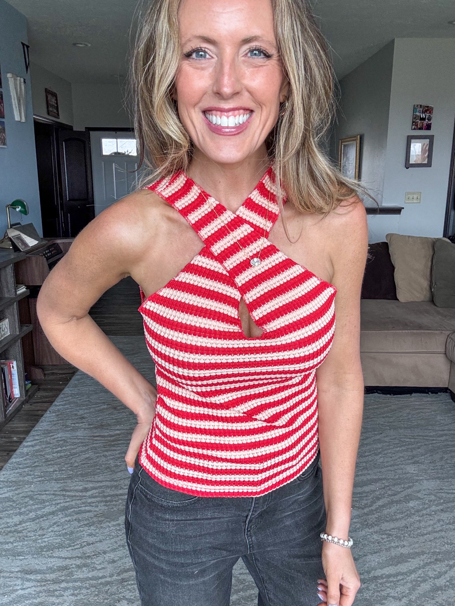 This red striped knit halter top is so, so good! ❤️ Loving it for a date night or girls night out! Wearing a small.

As an Amazon Influencer I earn commission on qualifying purchases.

Red striped top, date night outfit inspo, summer tank top, spring fashion 2026, mom style, summer tops