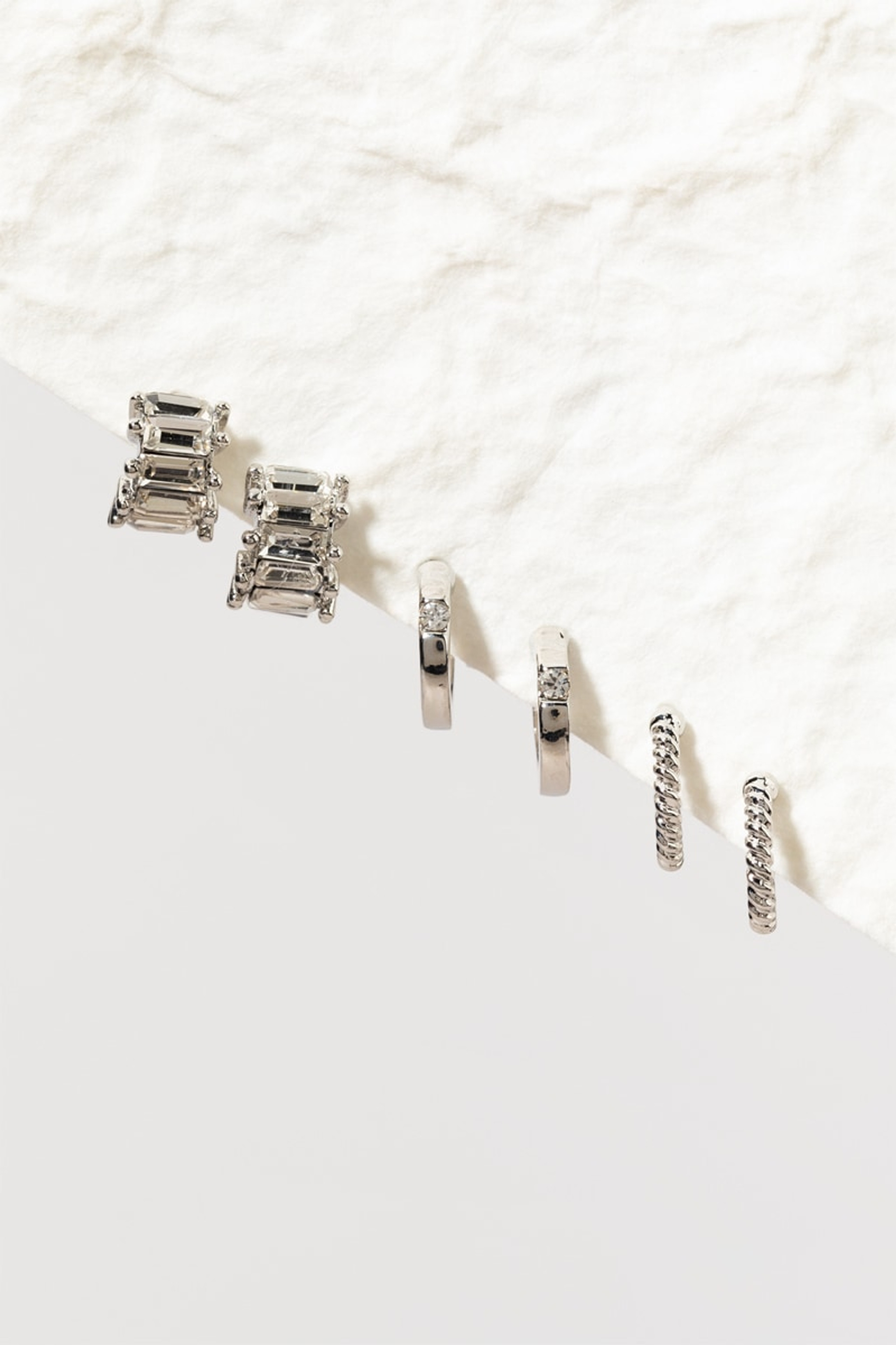 Jadie Glass Textured Huggie Earring Set | Francesca's