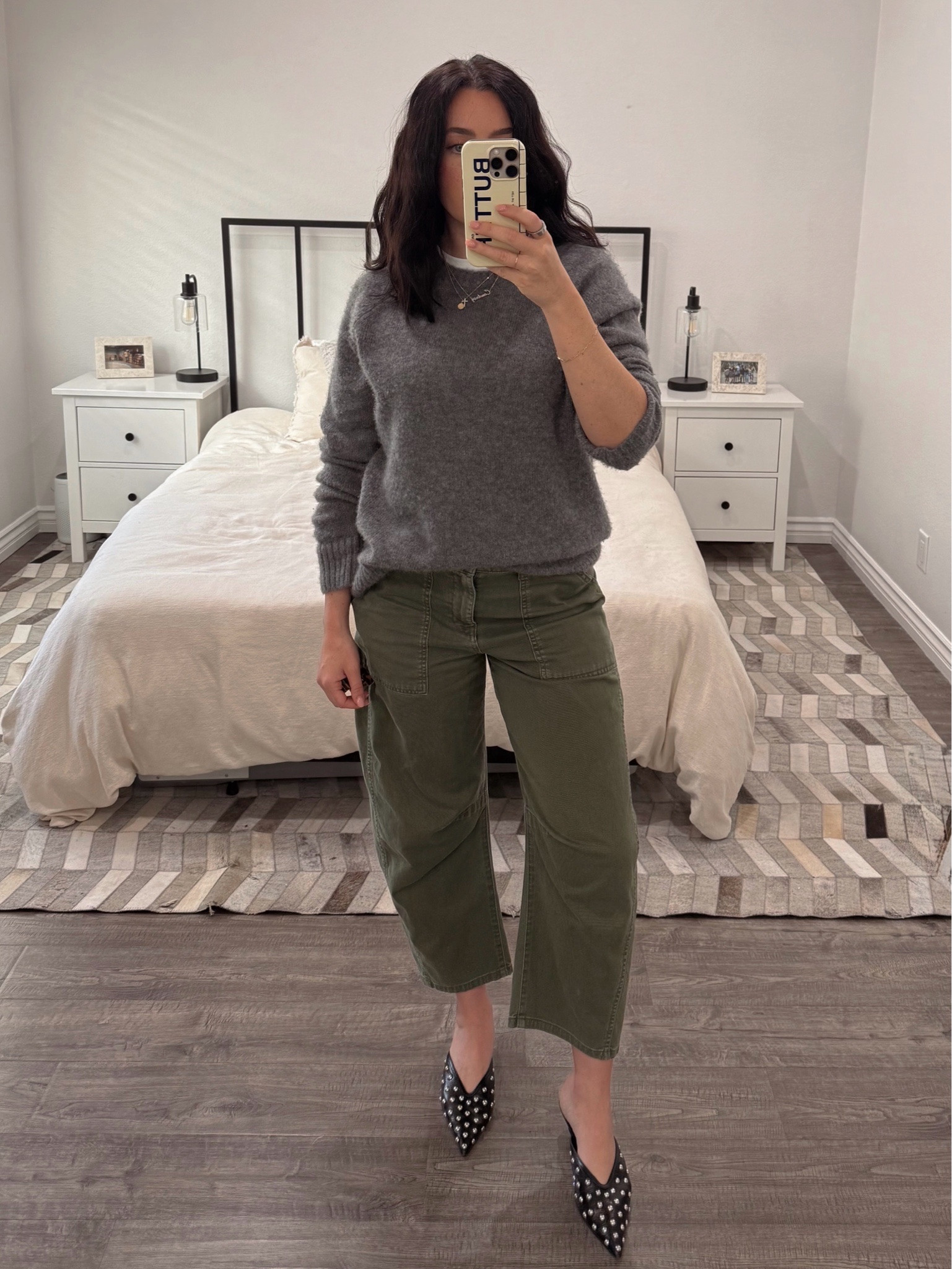Today’s office look: charcoal grey cashmere sweater layered over a white tee, olive barrel pants, and black pointed kitten heels. An easy, polished outfit built from simple staples.

#OfficeStyle #Workwear #OfficeOutfit #LTKStyle #CapsuleWardrobe #BusinessCasual #EverydayStyle #BarrelPants #KittenHeels #CashmereSweater #NeutralStyle #ClassicStyle #WorkOutfitIdeas #MinimalStyle #FallStyle 

#LTKootd #LTKWorkwear #LTKdayinmylife