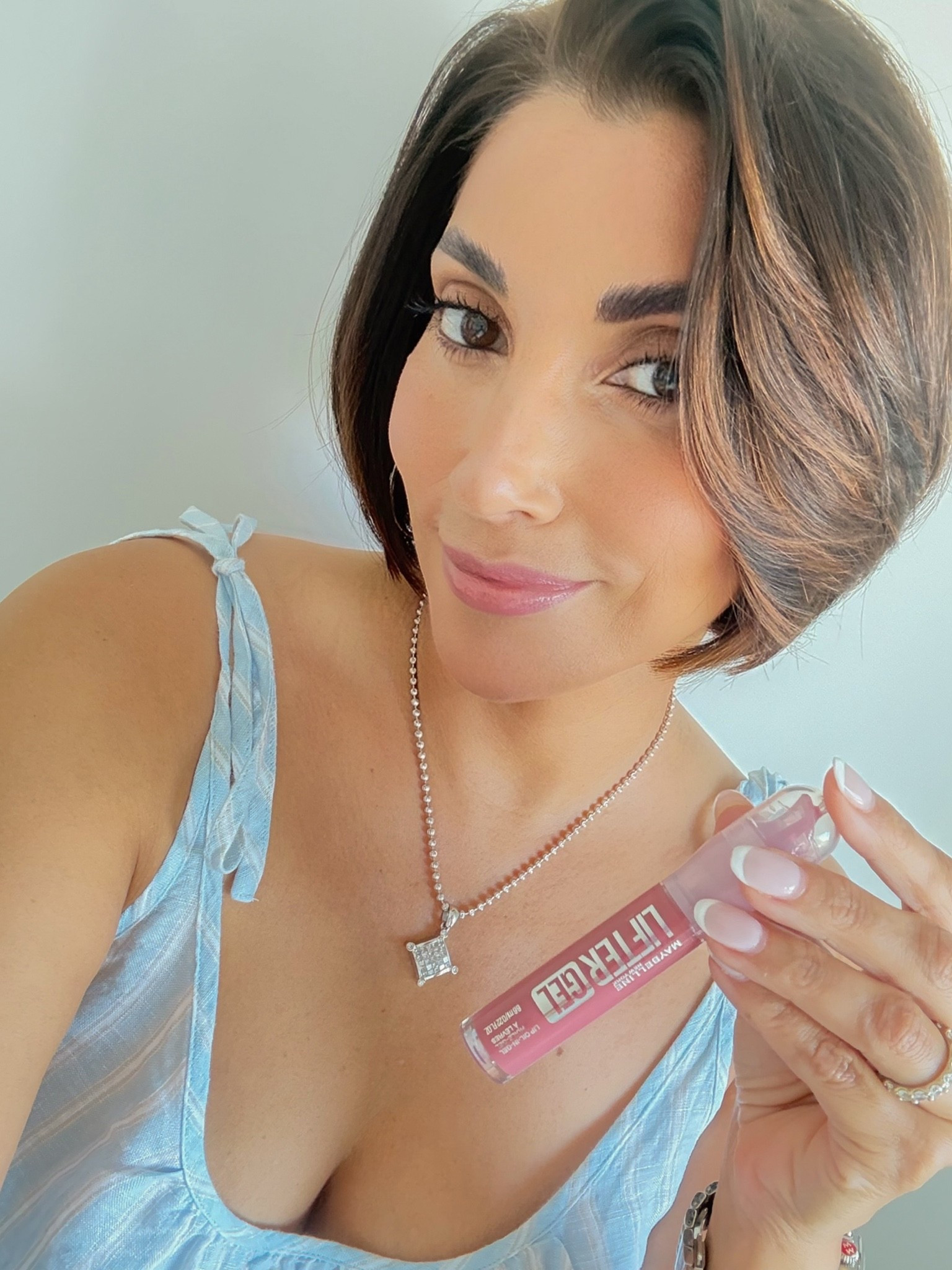 Obsessed with the lifter gel lip gloss by @maybeline I’m wearing shade “strawberry shake” and it’s the perfect mauve my pink.

#LTKBeauty #LTKOver40 #LTKselfcare