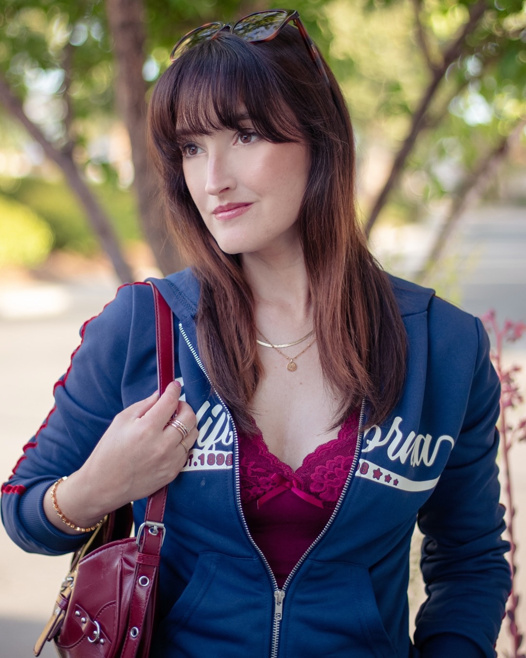 Serving two Y2K moods and I genuinely can’t pick a favorite 🦋

Look 1: California preppy
Denim mini + lace trim cami + retro zip hoodie and a pop of red bag. It’s giving early 2000s mall day in the best way

Look 2: Post Grunge Maximalism
Flared dark denim + graphic tee + structured crescent bag. A little edgy, a little nostalgic, but with a chic twist— very cool girl

#LTKSeasonal #LTKootd