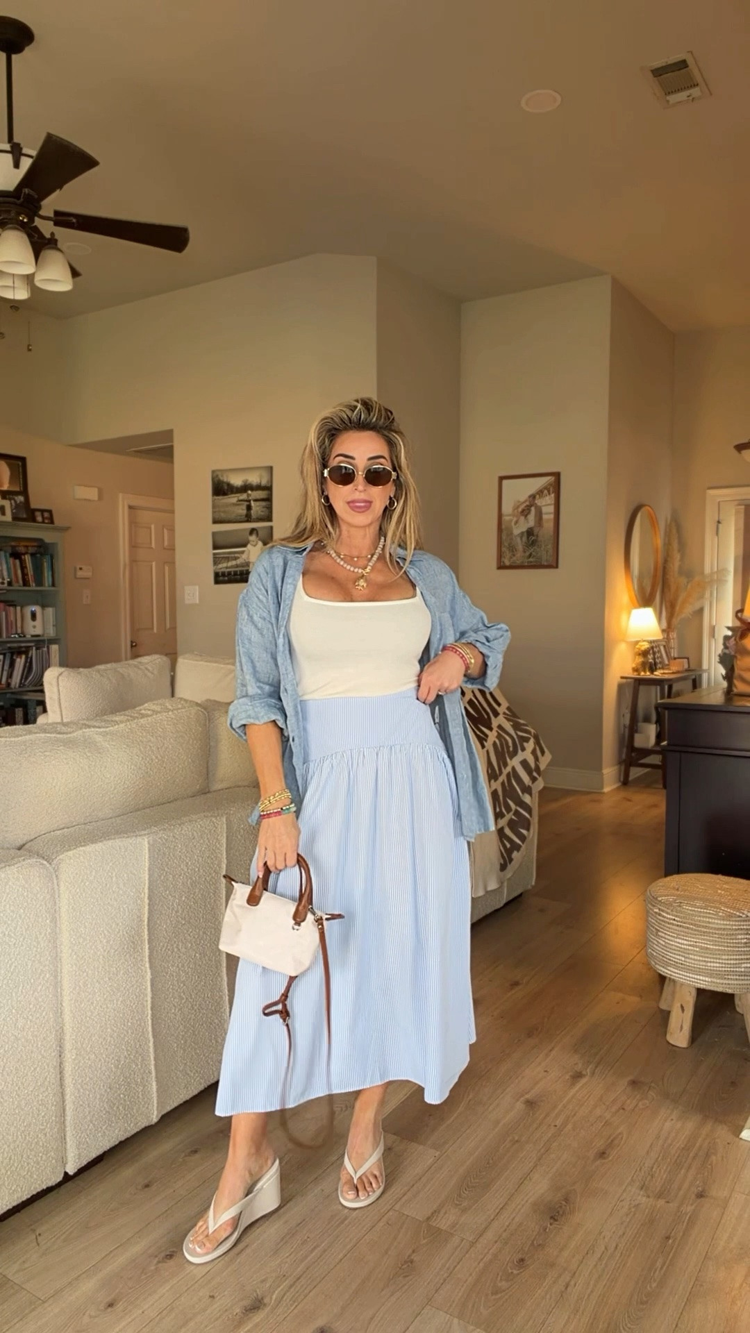 Easy breezy blue stripe midi skirt with tank and sandals. Would be cute with white canvas sneakers as well. 

Summer outfits, vacation outfits, chambray linen button down shirt, white tank top

#LTKootd #LTKOver40 #LTKTravel