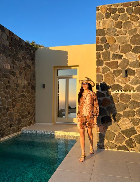 I never get the opportunity to wear all my swim cover-ups in the states so I brought them all to Santorini! I untied my drop waist python cover-up dress for a more relaxed fit. To complete the look, I wore my cowboy hat and calf hair sandals.

#LTKSeasonal #LTKeurope #LTKunder100