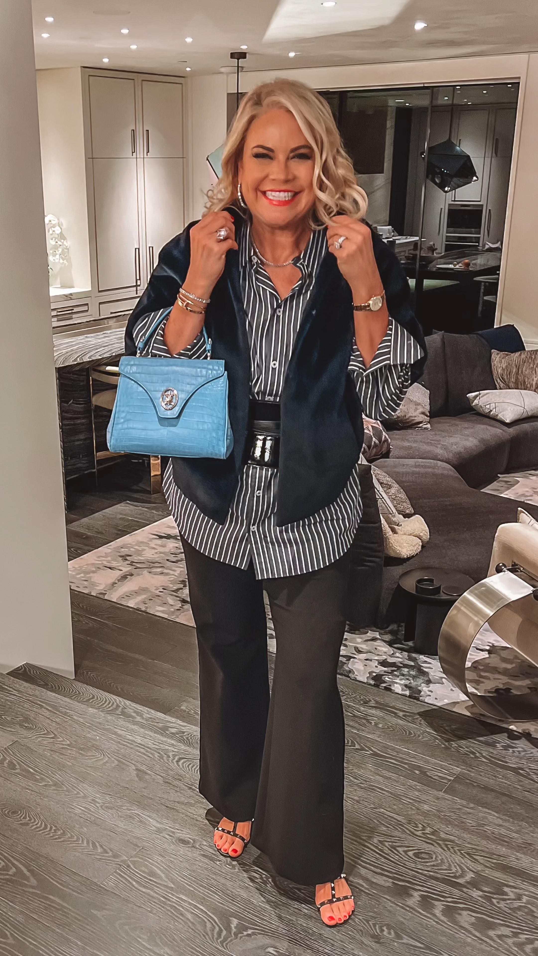 Oversized women’s boyfriend shirt. Women’s tuxedo pants. Fur vest. Slimming belt. Over 40 chic outfit  

#LTKover40 #LTKSpringSale #LTKSeasonal