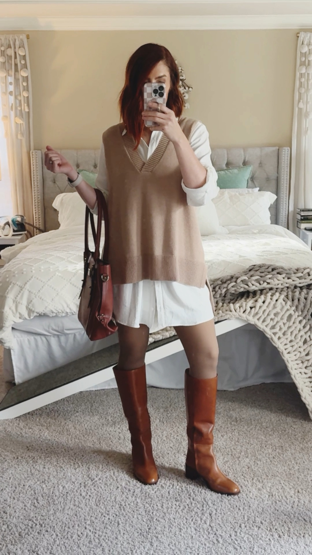 A large oversized vest paired with a white oversized button down shirt  and fleece lined tights work so well with statement boots and matching bag!

#LTKSeasonal #LTKHoliday #LTKStyleTip