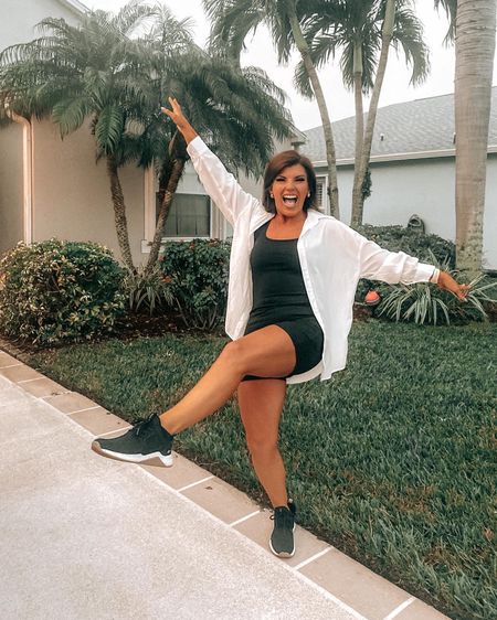 Cruise travel day attire - cozy and comfy biker romper, Reebok tennis shoes, sheer oversized T, and ready to travel!

#LTKfit #LTKtravel #LTKSeasonal