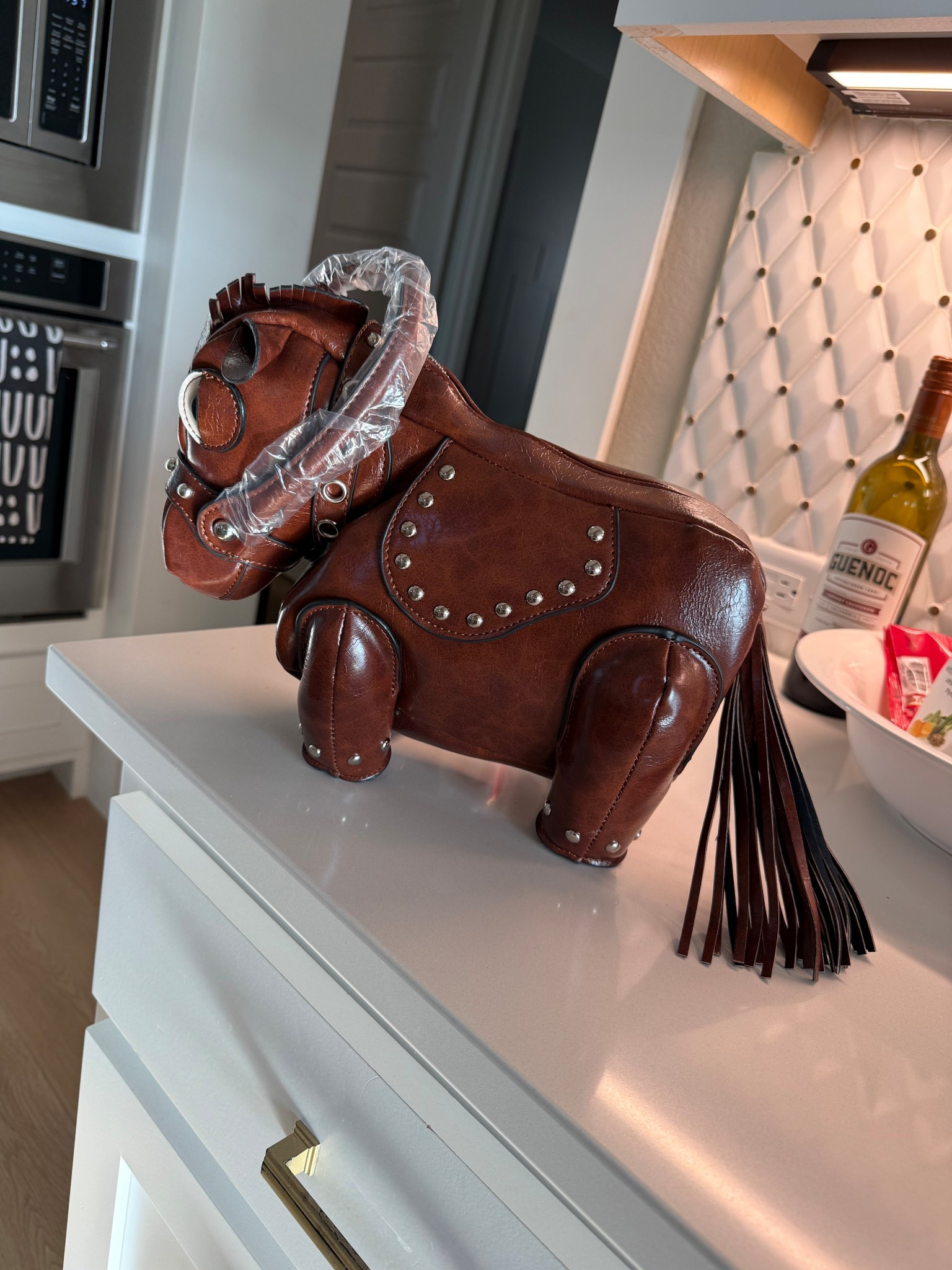 Big plans for this little guy. Mini horse purse!